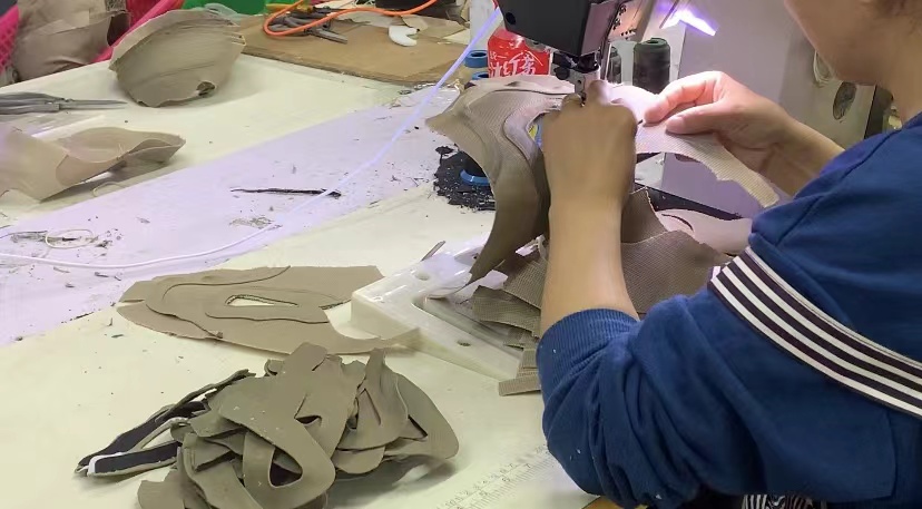 Footwear stitching room